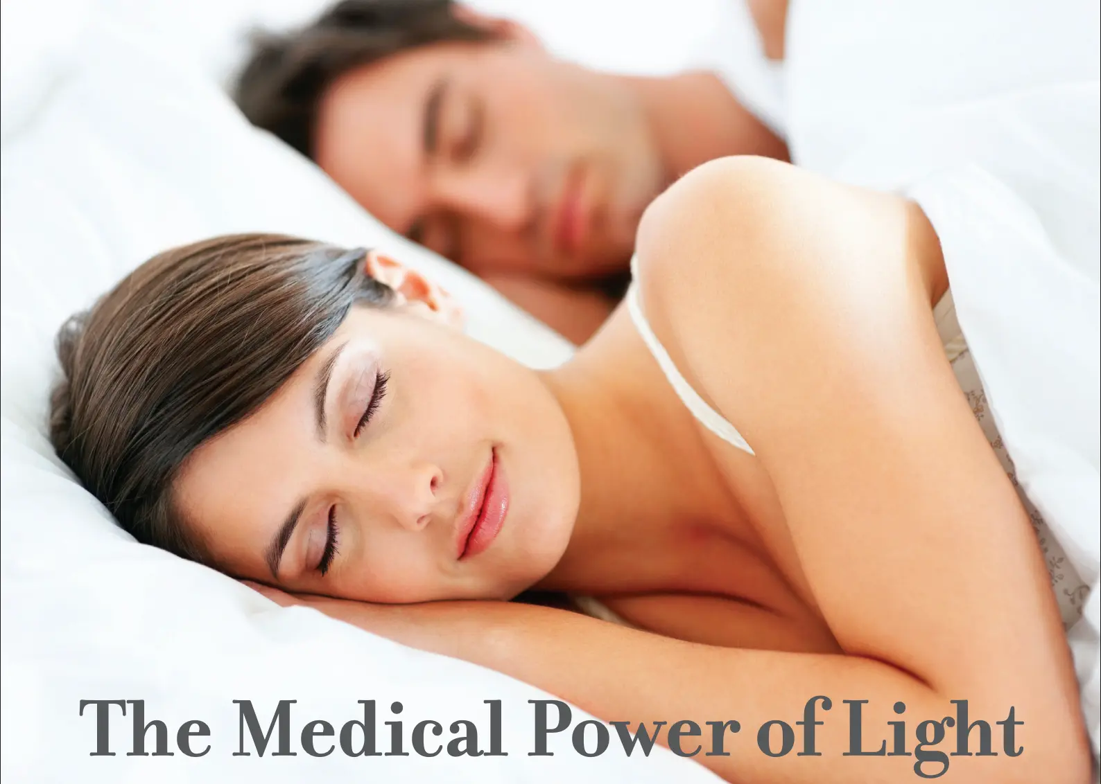 Couple sleeping restfully, representing NightLase snoring and sleep quality treatment